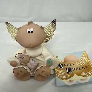 Angel Cheeks "ANGEL HOLDING BAY GIRL" Russ Handprinted #21794 w/tag. 2.5" x 2.5"